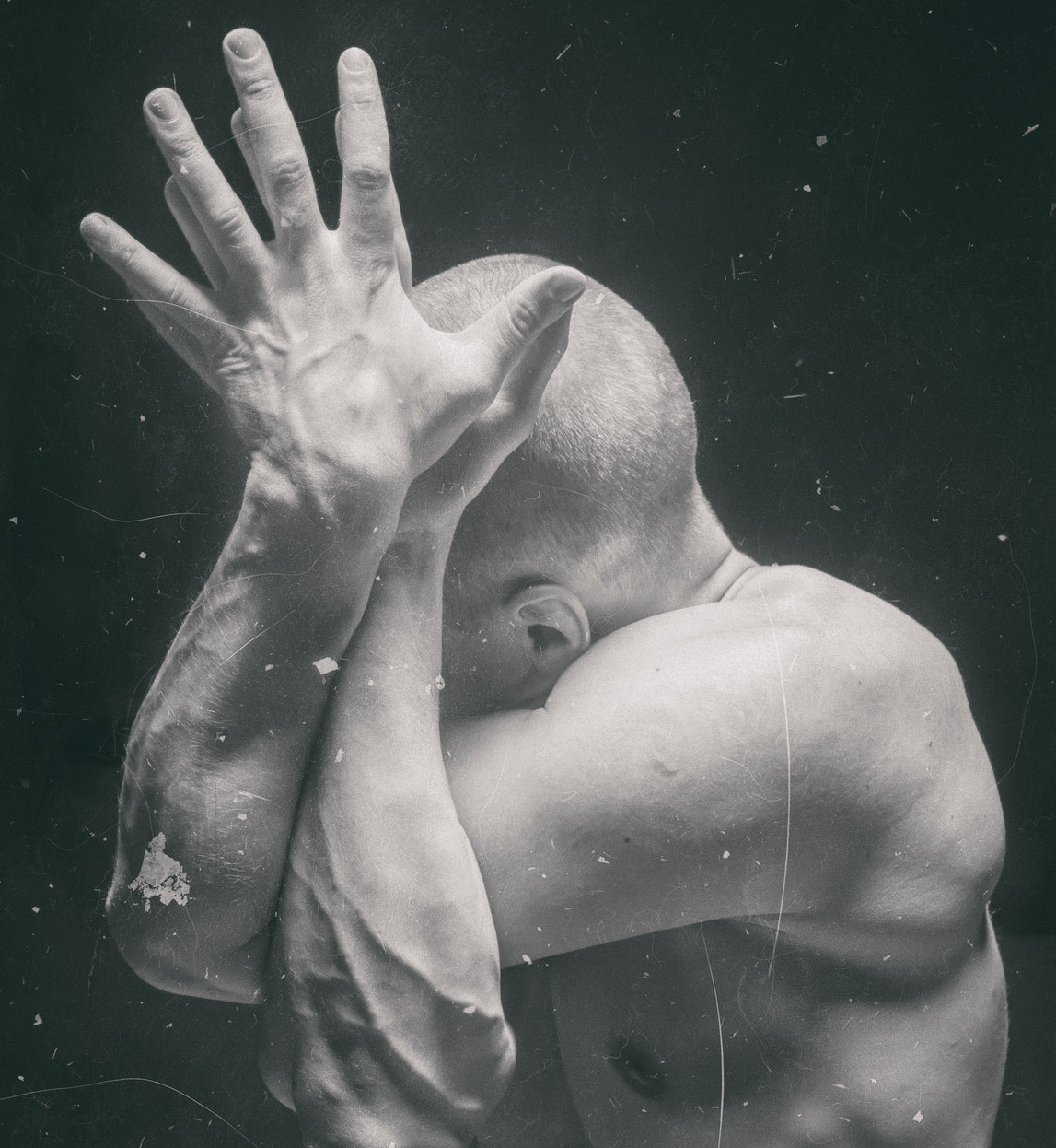 Futuristic, dramatic image of man in an artistic style, designed to give the impression of humanity's interaction with technology.